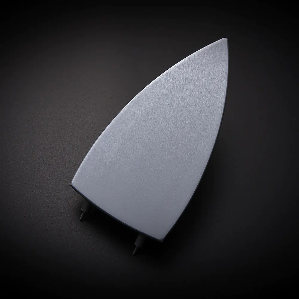 How can an iron with a Teflon soleplate improve efficiency and reduce damage to clothes during ironing?